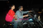 Arshad Warsi on his Harley bike with wife Maria as they went to watch The King_s Speech on 8th March 2011 (15).JPG
